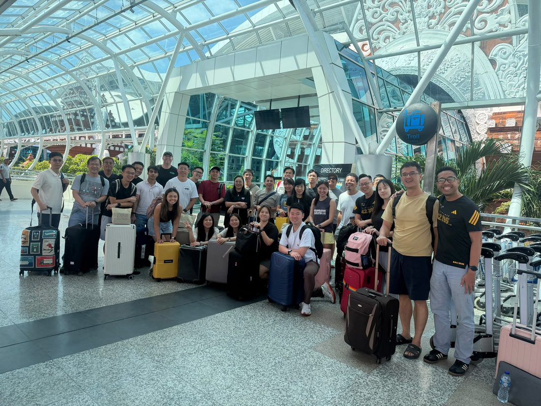 The group with their luggage at the airport in Bali
